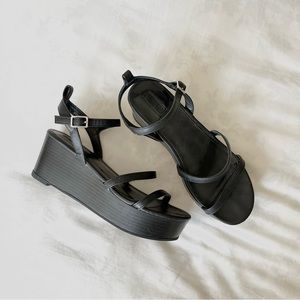 Black platform sandals